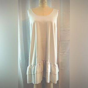 New Universal Standard Dress. Hi-lo, ruffle hem, pale blue.